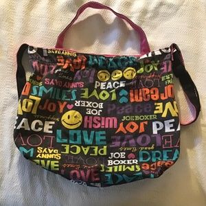 Vintage joe boxer wink and smile over the shoulder peace and love bag